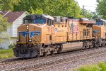 UP 7707, GE AC45CCTE, westbound on the UPRR